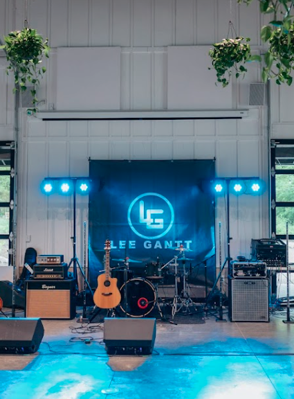 Wedding band musical equipment set up indoors with no people present at Retreat 21 near Columbus, Ohio